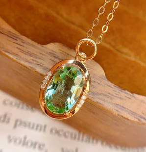 18k gold natural tourmaline necklace: 18k gold natural tourmaline necklace. Total weight: 1.51 grams Main stone: 2.5 carats Diamonds: 8 Reserve: $700.00 Shipping: Domestic: Shipping rates are determined by destination International: Forei
