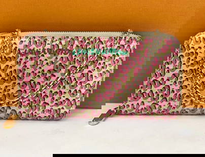Louis Vuitton Wallet Zippy Stephan Sprouse Vernis Leopard W/Added Chain: Pre-Owned 100% Authentic Louis Vuitton Zippy Stephan Sprouse Vernis Leopard W/added chain to carry as crossbody or Use as a Clutch RATING: B...Very Good, Shows some signs of wear MATERIAL: vernis pate