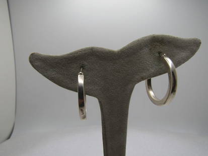 Vintage Sterling Hoop Earrings, Pierced, 1", 1980's-1990's: Vintage Sterling Hoop Earrings, Pierced, 1", 1980's-1990's. 3mm wide with a higned post and clip to lock the post into. They are rounded with a flat edge on the front and back. They are marked .925 an