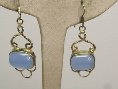 Vintage Blue Glass Drop Earrings, Pierced, 1990's. Boho Themed.: Vintage Blue Glass Drop Earrings, Pierced, 1990's. These have a hook post and are marked .925 but do not test as sterling. The drop has an appx. 15mm by 11mm bezel-set domed blue glass rectangular sto