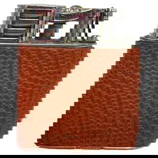1930s Dunhill "Globetrotter" Crocodile Leather Wrapped Sports Lift Arm Lighter: About the Item Art Deco "Globetrotter" Sports Petrol Lighter by Dunhill. The lighter is wrapped in Crocodile Leather with rhodium-plated trim. The Art Deco design blends streamlined contours with geom