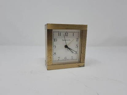 Mid Century Modern Tiffany & Co Machined Desk Clock: Vintage from before 2000 Mid Century Modern Tiffany &amp; Co Machined Bronze/Brass Square Mantel/Desk Clock Very nice quality Mid-Century Modern Tiffany desk clock. Heavy machined brass or bronze case