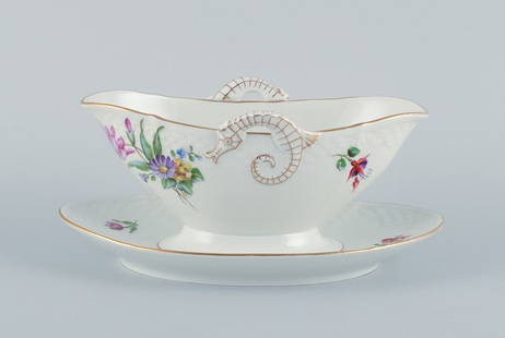 Bing & Grøndahl, Saxon Flower, a hand-painted sauce boat with handles shaped like seahorses.: Bing & Gr&#248;ndahl, Saxon Flower, a hand-painted sauce boat with handles shaped like seahorses. Approx. 1920/30s. Model number 8. Marked. First factory quality. In perfect condition. Dimensions: L 2