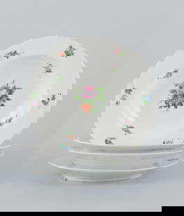 Royal Copenhagen, set of four rare and antique Saxon Flower porcelain plates. Hand-painted with: Royal Copenhagen, set of four rare and antique Saxon Flower porcelain plates. Hand-painted with polychrome floral motifs. Three deep plates and one dinner plate. 1810-1850. Marked. First factory quali