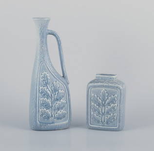 Rörstrand, Sweden. Large pitcher/vase and a smaller vase in ceramic. Branches with relief: R&#246;rstrand, Sweden. Large pitcher/vase and a smaller vase in ceramic. Branches with relief leaves. Glaze in light blue tones. From the 1960s. Marked with the manufacturer's mark. In perfect condit