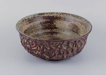 Axel Salto for Royal Copenhagen, large ceramic bowl designed with leaf patterns in relief.