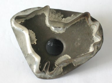 Antique folksy tin bird cookie cutter.