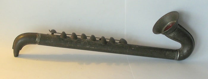 Antique tin toy Saxophone.