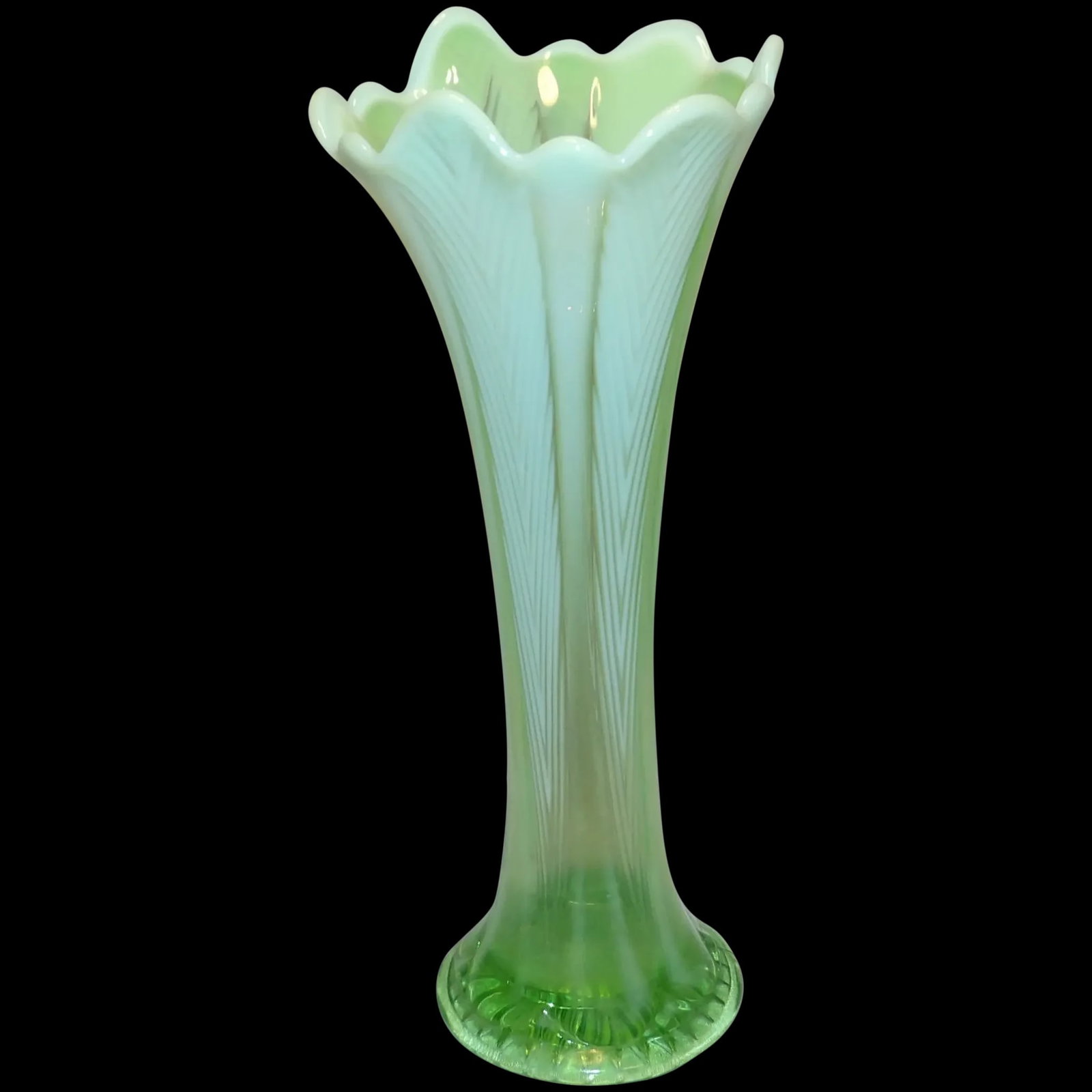 Fenton Opalescent Stretch Vase: This Fenton Opalescent Stretch Vase is in excellent condition. NO chips or flea bites. It measures 11” tall with a base of 3 5/8”. Stretch vase have been and continue to be one of the more
