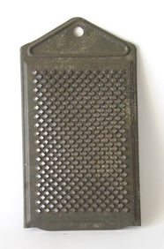 Antique miniature tin food grater.