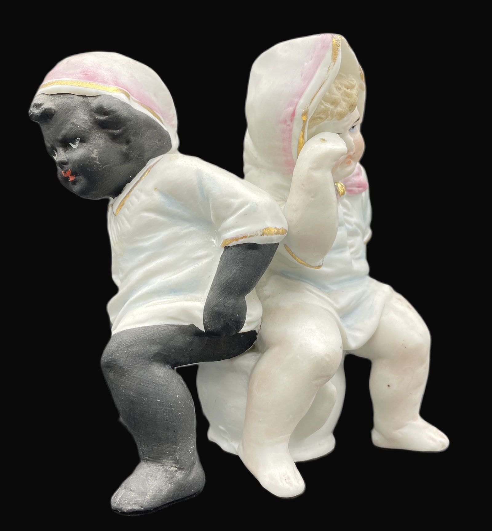 PORCELAIN BABIES ON CHAMBER POT Black & White Children: Title: PORCELAIN BABIES ON CHAMBER POT Black & White Children Date/Period: unknown Dimension: Approx. 4.25 Material: porcelain Additional Information: BISQUE PORCELAIN POTTY W TWO BABIES ON CHAMBER PO