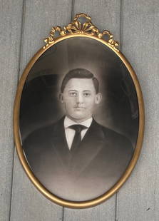 Old Metal Oval Convex Picture Frame w/ photo of Man: Title: Old Metal Oval Convex Picture Frame w/ photo of Man Date/Period: unknown Dimension: Approx. 22x 14" Material: metal, glass Additional Information: Old Metal Oval Convex Picture Frame w/ photo o