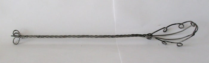 Antique wire country kitchen whisk.
