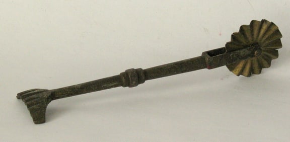 Antique solid brass pie crimper.