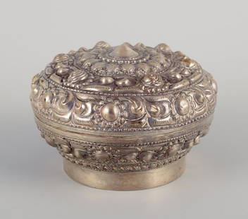 Chinese silversmith. Lidded jar richly decorated in relief with flowers and ornaments.: Title:Chinese silversmith. Lidded jar richly decorated in relief with flowers and ornaments. Description:Chinese silversmith. Lidded jar richly decorated in relief with flowers and ornaments. China ap