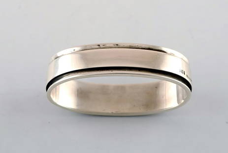 Georg Jensen. Sterling (925). Napkin Ring. Pyramid. Design 22B.: Title:Georg Jensen. Sterling (925). Napkin Ring. Pyramid. Design 22B. Description:Georg Jensen. Sterling (925). Napkin Ring. Pyramid. Design 22B. Measures: Inside: 44 mm. x 22 mm. Stamped. In perfect