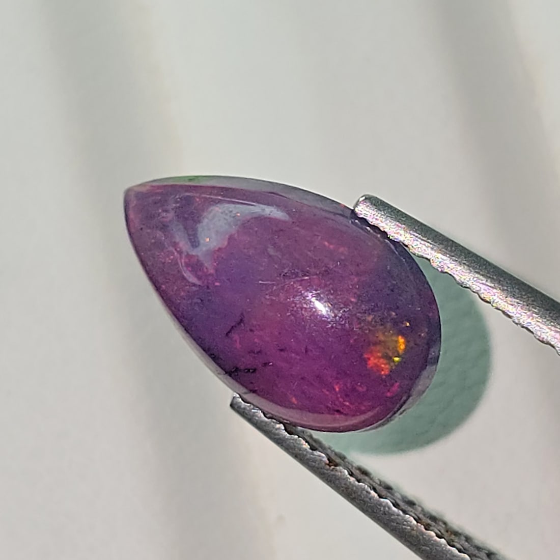 1.29 Ct "Play Of Colors" Natural Black Opal: Title:1.29 Ct "Play Of Colors" Natural Black Opal Description:Gemstones: Natural Black Fire Opal / Carat Weights: 1.29 ct / Size or Dimensions: 11.50 X 7 X 3.80 mm Treatment: Heated Materials &Techniq