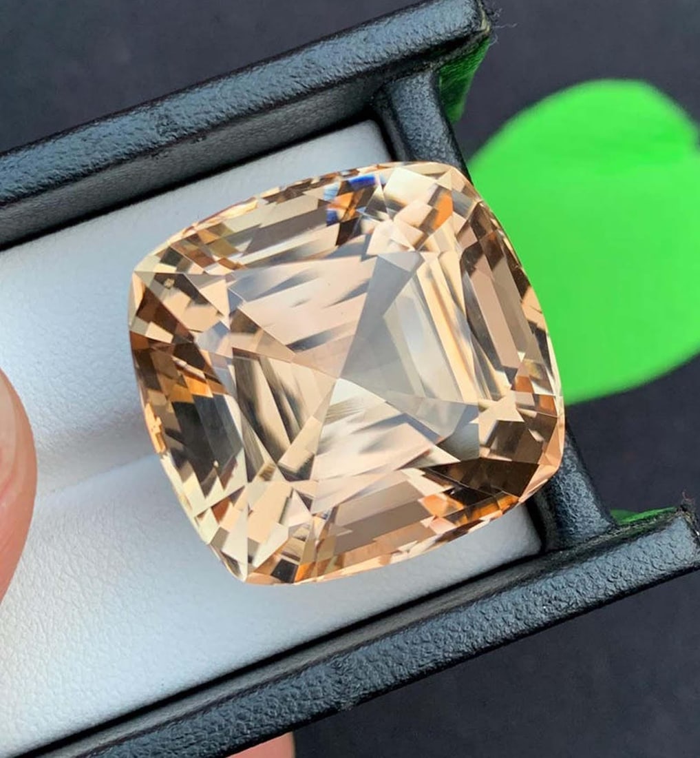 Natural Imperial Topaz Gemstone, Golden Color Faceted Cushion Cut For Jewelry, November Birthstone: Materials: Gem type: Topaz Natural Imperial Topaz Gemstone, Golden Color Faceted Cushion Cut For Jewelry, November Birthstone Wight - 89.29 Carats Dimensions : 24.9*23.4*17.9 mm Color : Golden Yellow