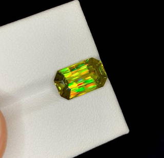 Natural Sphene Titanite Gemstone, Full Fire Lustrous Sphene Fancy Emerald Shape, for Ring, June: Materials: Gem type: Sphene Carat weight: 3.30 Natural Sphene Titanite Gemstone, Full Fire Lustrous Sphene Fancy Emerald Shape, for Ring, June Birthstone Weight : 3.30 cts Dimensions : 11*6.5*4 mm Col
