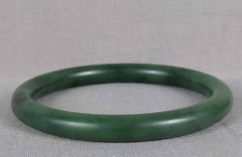 Vintage CHINESE nephrite JADE BANGLE BRACELET: Vintage Chinese jade bangle made out of spinach green true nephrite. Excellent quality stone with superb color, beautiful work, wonderful matte finish to the surface, very pleasant to handle. Inside d