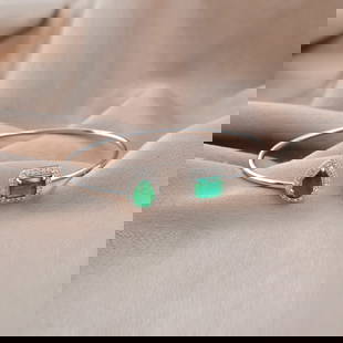 Zambian Emerald Diamond Cuff Bangle 14k White Gold: Title: Zambian Emerald Diamond Cuff Bangle 14k White Gold Description: Item Code : SEB-6021R, Gold : 5.5 gm : 0.42 ct. Diamond(Hi color Si clarity) : 2.28 ct. Emerald : Gross Wt. : 6.04 Gm Metal: 14k