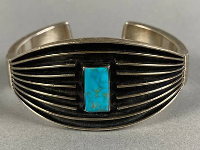 Intriguing Navajo Sterling Silver Cuff Bracelet With Inlaid Turqoise Stone By Frances: The bracelet is in excellent condition. The weight of the piece is shown in the last picture. Frances Jones is an award-winning Navajo jeweler known for her channel work, also called "tracks." She lea