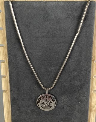 Magnificent Hopi Sterling Silver Necklace & Chain With Man In The Maze Design By Clement Honie: The necklace is in very good condition. The weight of the piece is shown in the last picture. The necklace features the 'Man in the Maze' Hopi design which represents man emerging from the center of t