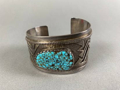 Vintage Navajo Native American Turquoise Cuff Bracelet By Richard Tsosie: The bracelet is in excellent condition. The weight of the piece is shown in the last picture. The bracelet has a scalloped edge and is inlaid with stones that appear to be turquoise, lapis, coral and