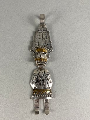 Vintage Native American Navajo 3D Kachina Pendant By Tommy Singer: The pendant is in very good condition. The weight of the piece is shown in the last picture. It is signed on the back by the artist, Tommy Singer. It is not marked sterling, but it has the appearance 