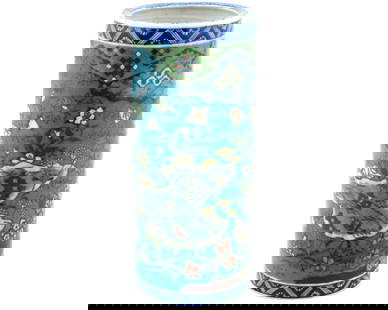 Antique Japanese Cloisonne Enamel on Porcelain Floral Vase: About the Item An antique Japanese porcelain vase with polychrome design. Meiji period, circa 1870 Cylinder shape. Hand-painted blue and white patterned rims. Floral and geometrical cloisonne enamel o
