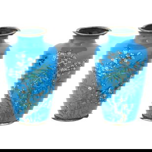 Pair of Meiji Japanese Cloisonne Turquoise Enamel Silver Birds In Bamboo Vases: About the Item A pair of identical antique Japanese, late Meiji era, Silver wire enamel vases. Each vase has an urn shaped body and a wide fluted neck. Each vase is enameled with polychrome images of