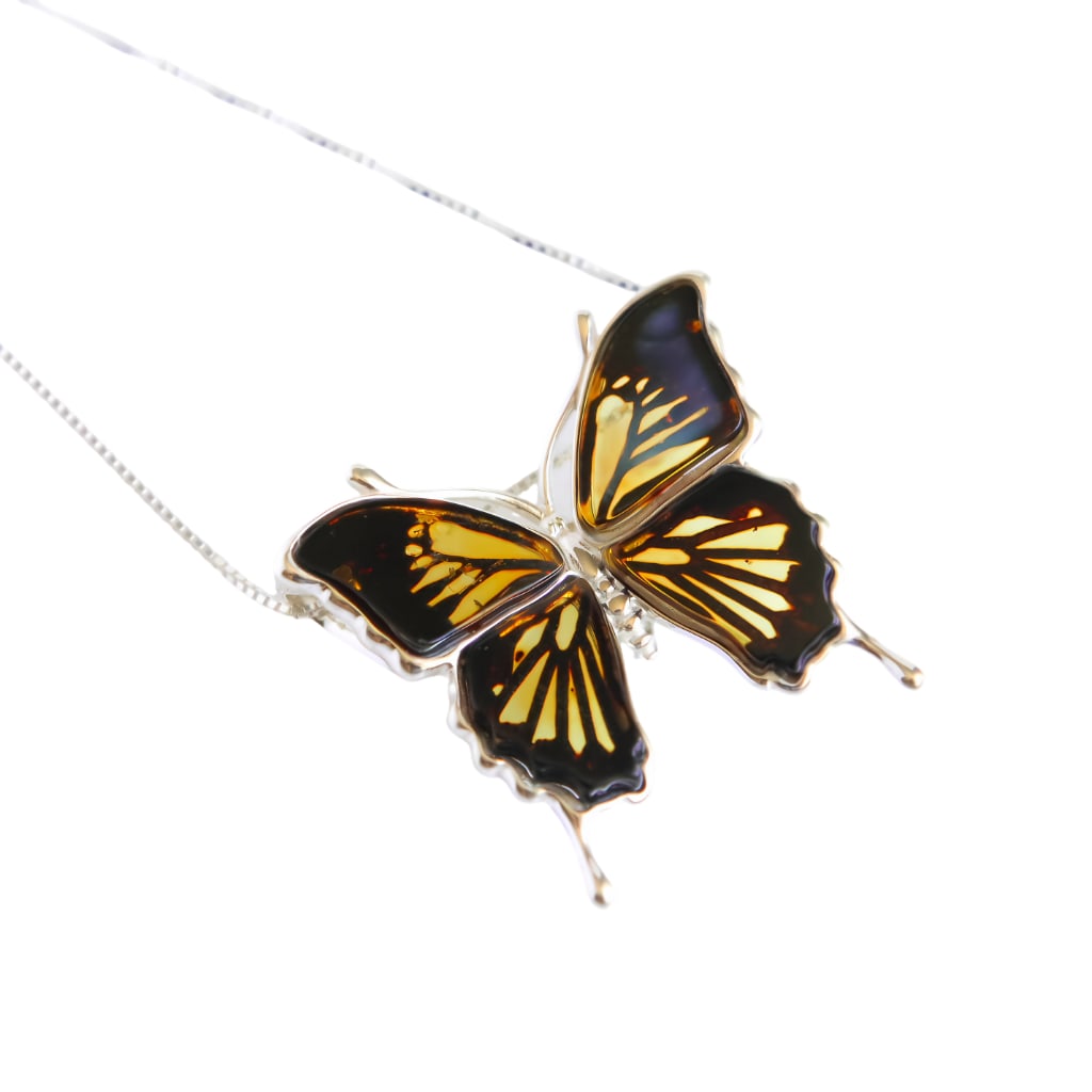 Baltic Amber Butterfly Necklace in 925 Sterling Silver: Title:Baltic Amber Butterfly Necklace in 925 Sterling Silver Description:Baltic Amber Butterfly Necklace in 925 Sterling SilverIntroducing our Baltic amber butterfly necklace, beautifully designed wit