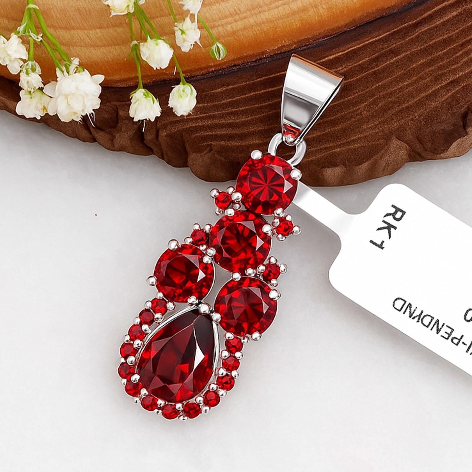 Natural Garnet Sterling Silver Pendant: Title:Natural Garnet Sterling Silver Pendant Description:Natural Garnet Sterling Silver Pendant Jewelry Type : Pendant Main Stone : Garnet Main Stone Shape : Round, Pear Metal Type : Sterling Silver