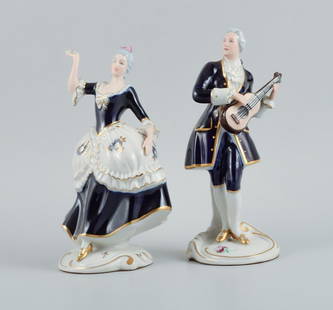 Royal Dux. Rococo couple in hand-painted porcelain.: Royal Dux. Rococo couple in hand-painted porcelain. Perfect condition. 1940s. Marked. The woman measures: 21.0 x 13.0 cm. The man measures: 22.0 x 9.0 cm. Reserve: $392.00 Shipping: Domestic: Shipping