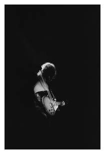 Jimmy Page At The Forum 12x16" Archival Pigment Print: Description Jimmy Page At The Forum 12x16" Archival Pigment Print Guitarist Jimmy Page of the rock band “Led Zeppelin” plays his Gibson Les Paul electric guitar with a bow at the Forum on