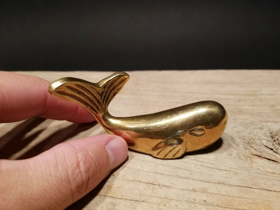 Brass Whale Paperweight Desk Statue: 3" Long x 1" wide 1lb 8oz Very accurate and well made reproduction of an antique paperweight. All solid brass. Certainly easy to wonder its age All our items come with a 100% customer satisfaction gua