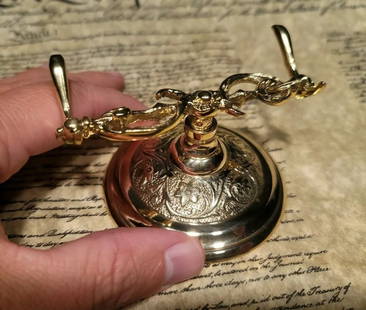 Ornate Golden Brass Pen Holder Desk Stand: 3 3/4" Long 2 1/8" Tall Nice reproduction of an antique pen holder. (pens shown available separately) This piece is all solid brass, well made! Good quality for any early home decor for use or display