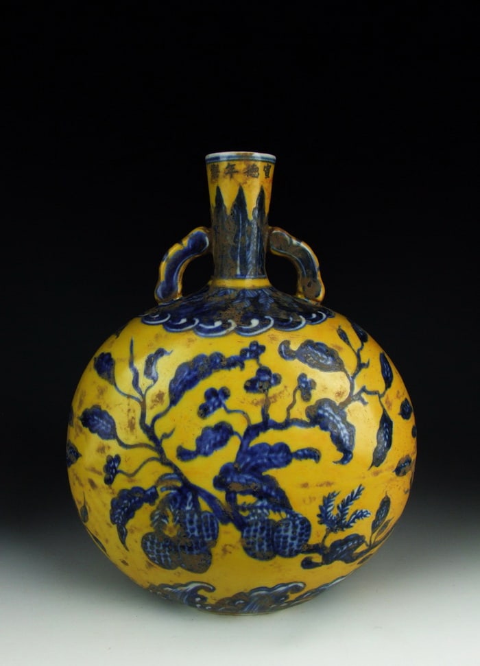 A Yellow and Blue Glazed Moon Flask: Title: A Yellow and Blue Glazed Moon Flask Description: A Yellow and Blue Glazed Moon Flask, H 28cm Materials: Porcelain Reserve: $900.00 Shipping: Domestic: Flat-rate of $300.00 to anywhere within th