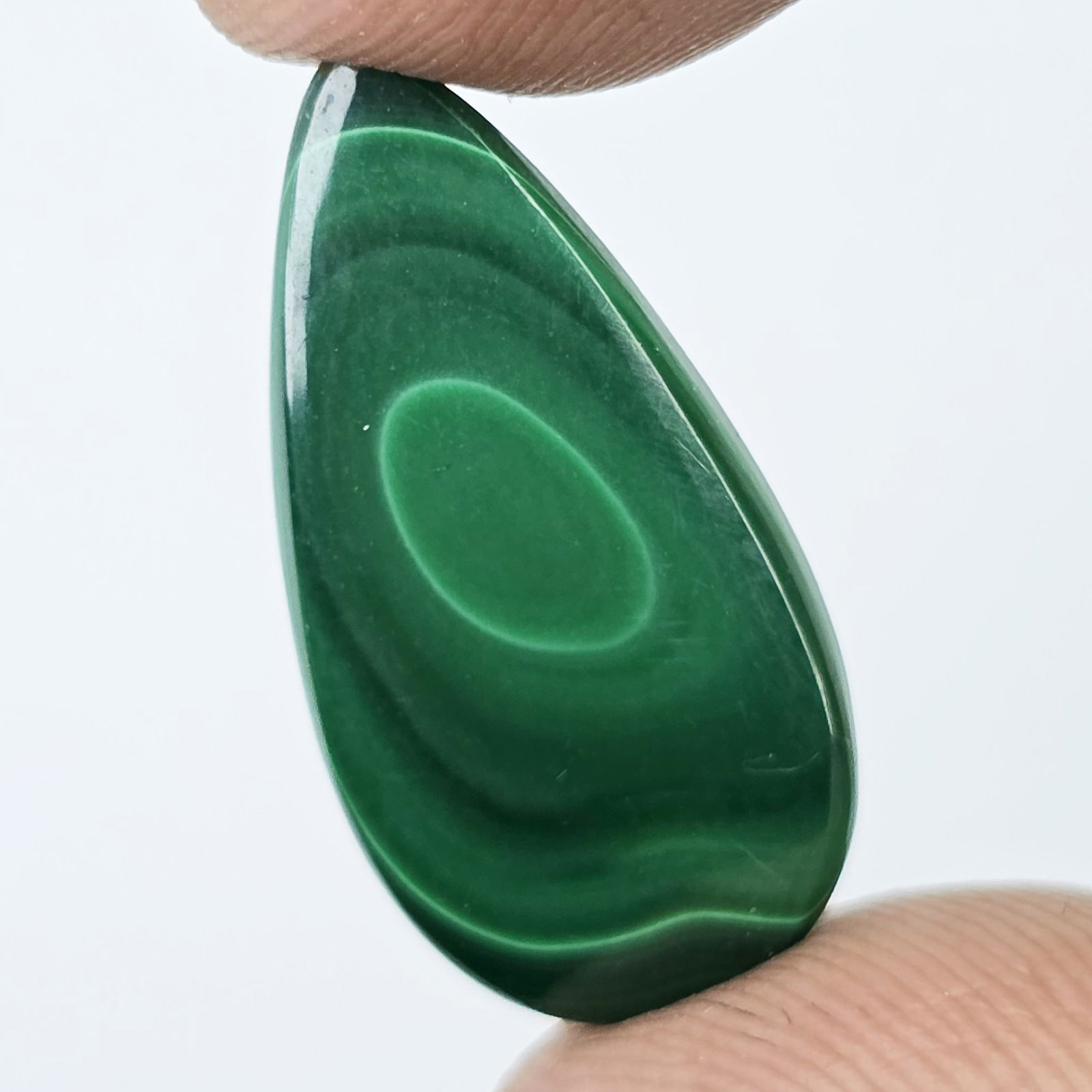 10 Ct Natural malachite: Title:10 Ct Natural malachite Description:Gemstones: Natural Malachite / Carat Weights: 10 ct / Size or Dimensions: 24.40 X 12.50 X 3 mm / Treatment: No Materials &Techniques:Malachite Reserve: $10.00