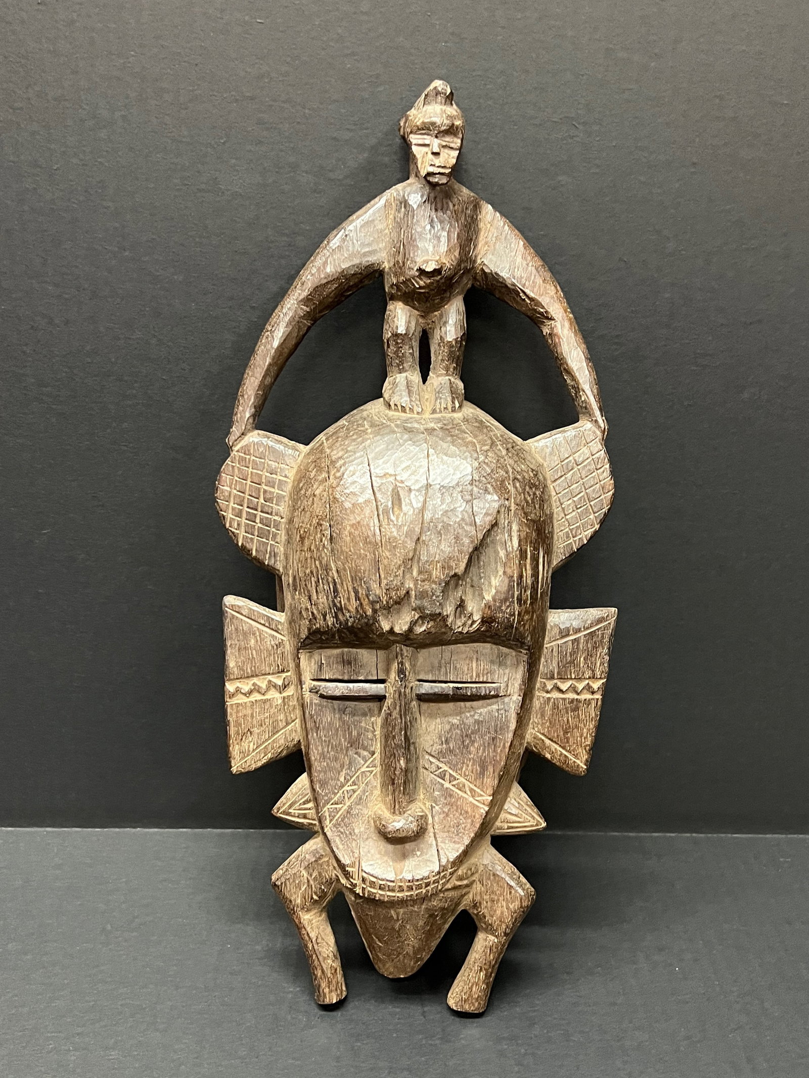 Senufo Mask: Title: Senufo Mask Date/Period: Late 20th Century Dimension: 17" h x 8" w Material: Wood Additional Information: African Tribal Art Senufo Mask Reserve: $100.00 Shipping: Domestic: Flat-rate of $40.00