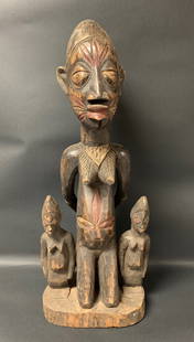 Yuroba Maternity Statue: Title: Yuroba Maternity Statue Date/Period: Late 20th Century Dimension: 23.75" h x 9.75" w Material: Wood Additional Information: African Tribal Art Yuroba Maternity Statue Reserve: $300.00 Shipping: