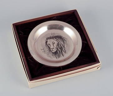 Bernard Buffet (1928-1999), French artist. Year plate in sterling silver. 1976. Engraved image of a: Title:Bernard Buffet (1928-1999), French artist. Year plate in sterling silver. 1976. Engraved image of a lion. Description:Bernard Buffet (1928-1999), French artist. Year plate in sterling silver. 19