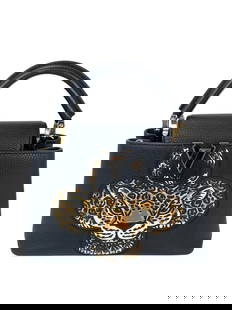 Louis Vuitton Taurillon Capucines Leopard BB Black Shoulder Bag: Pre-Owned 100% Authentic Louis Vuitton Taurillon Capucines Trapped Leopard BB Black Shoulder Bag RATING: A/B...Very Good, well maintained, shows minor signs of wear MATERIAL: taurillon leather STRAP: