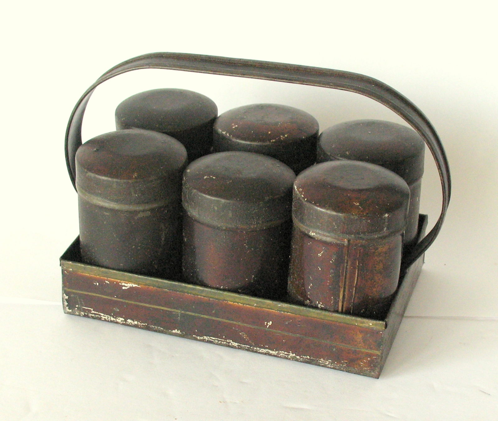 Antique set of tin spice canisters & carrier. (1 of 6)