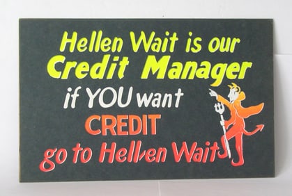 Vintage cardboard “Credit Manager” store sign.