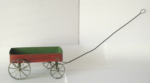 Antique tin toy “EXPRESS” wagon.