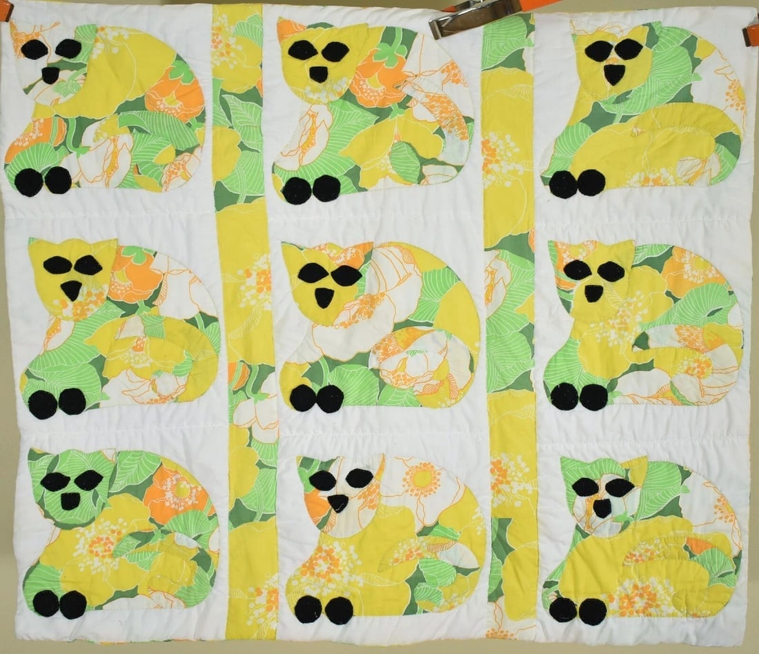 Folky Mid-20th-Century Cats Applique Crib Quilt: This CHEERY cotton 1960's / 1970's cat crib quilt is all hand appliqued, with black felt appliqued eyes and paws. It measures 41" X 48" and is in excellent condition, with a couple of small, faint spo