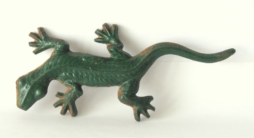 Antique cast iron lizard paper weight.