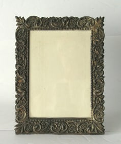 Antique brass table top picture frame.