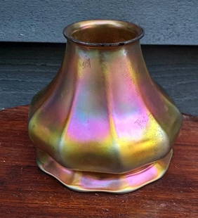 Stueben Art Glass Electric lamp shade Iridescent glass unsigned: Great looking piece in very good condition. Small chip in collar. Measures approximately 5" tall and 5" at widest point. Shipping charges include insurance. Shipping: Domestic: Flat-rate of $20.00 to
